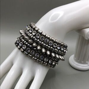 Silver tone sparkling rhinestones spiked spikes statement style bracelet, edgy.